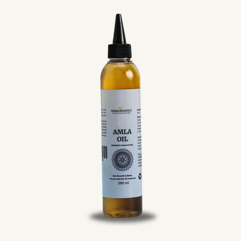 Amla-Oil-Coconut 250Ml  Amla Oil Infusion In Coconut Oil softness, natural shine, and improves manageability: By Mara Organics